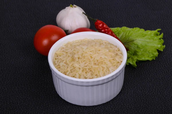 Raw Uncooked Rice Bowl Served Pepper Salad Leaves — Stock Photo, Image