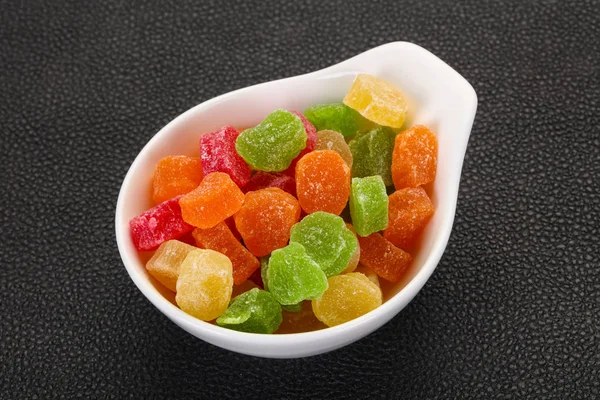 Sweet candied fruit heap in the bowl