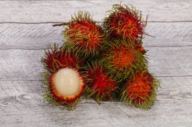 Tropical sweet exotic fruit Rambutan  clipart