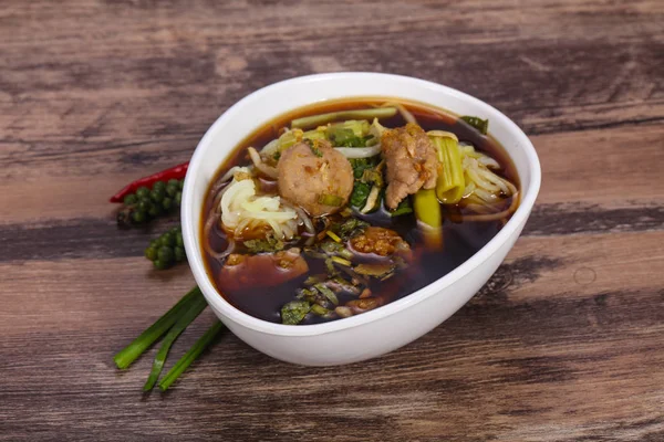 Thai style soup with meat and mushrooms — Stock Photo, Image