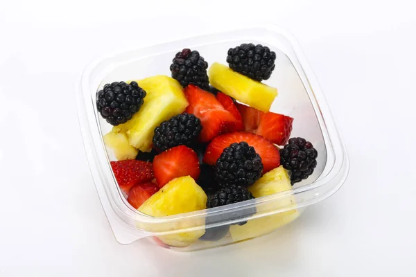 Mistura de frutas fatiadas na caixa — Fotografia de Stock