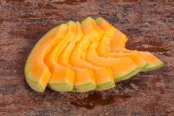 Rebanadas sabroso dulce en rodajas de melón —  Fotos de Stock