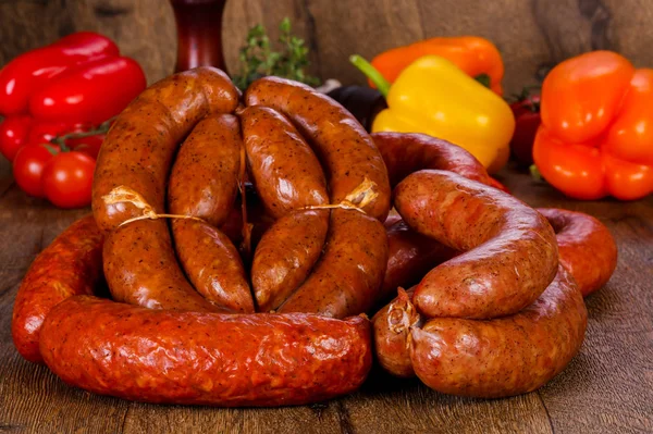 Pork sausages over wooden — Stock Photo, Image