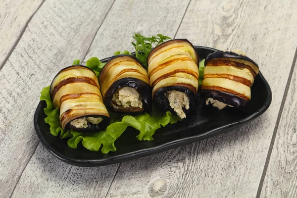 Stuffed eggplant roll with cheese and herbs — Stock Photo, Image