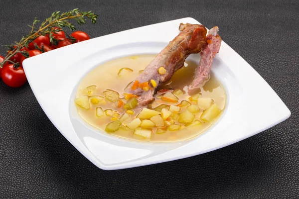 Peas soup with ribs — Stock Photo, Image