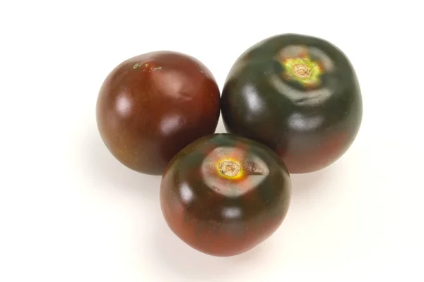 Black tomato -tasty fresh Kumato — Stock Photo, Image