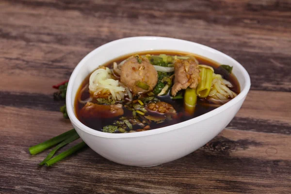 Thai style soup with meat and mushrooms — Stock Photo, Image