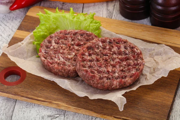 Raw burger cutlet