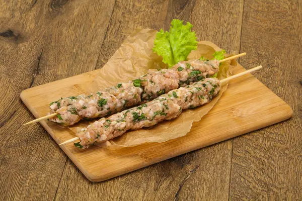 Raw minced pork skewer kebab for grill — Stock Photo, Image