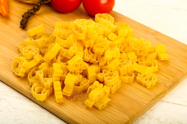 Raw pasta for kids — Stock Photo, Image