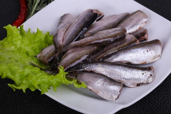 Ansjovis fisk mellanmål i skålen — Stockfoto