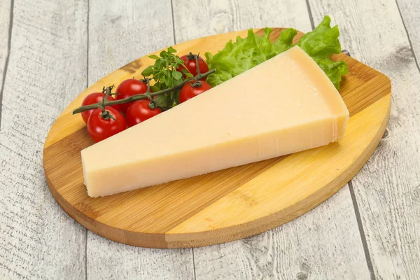 Italian traditional parmesan cheese triangle — Stock Photo, Image