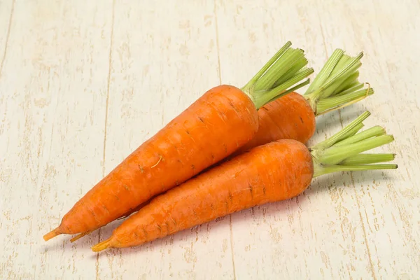 Three Young fresh ripe carrot — Stock Photo, Image