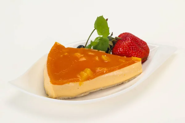 Cheesecake with apricot served strawberry — Stock Photo, Image