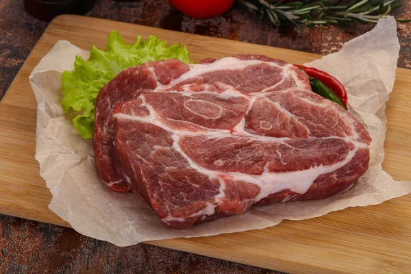 Raw pork neck steak — Stock Photo, Image