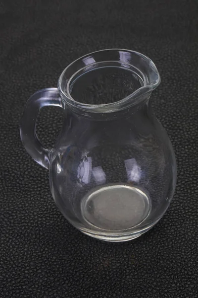 Empty glass jug — Stock Photo, Image
