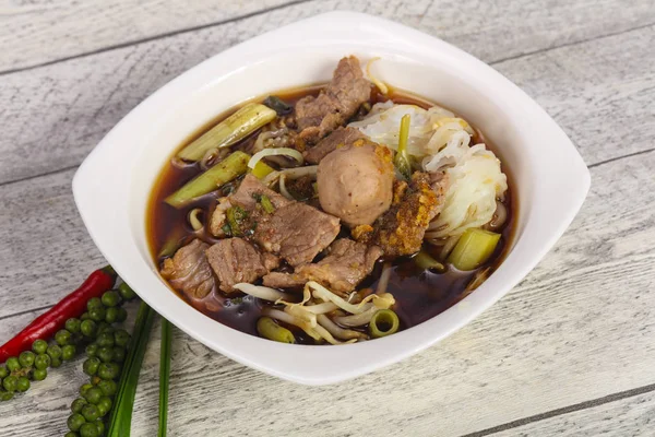 Thai style soup with meat and mushrooms — Stock Photo, Image