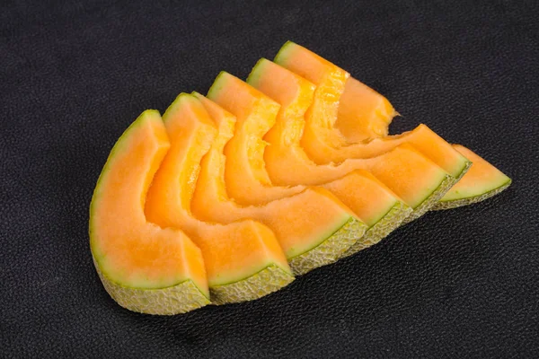 Rebanadas sabroso dulce en rodajas de melón — Foto de Stock
