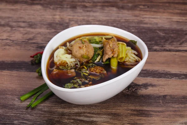 Thai style soup with meat and mushrooms — Stock Photo, Image