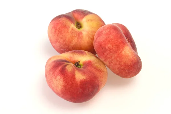 Sweet ripe tasty flat peach — Stock Photo, Image