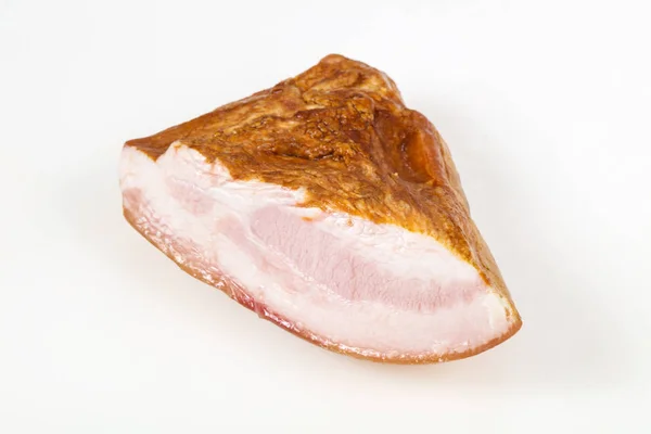Carne de porco defumada sobre fundo branco — Fotografia de Stock