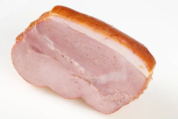 Viande de porc fumée sur fond blanc — Photo