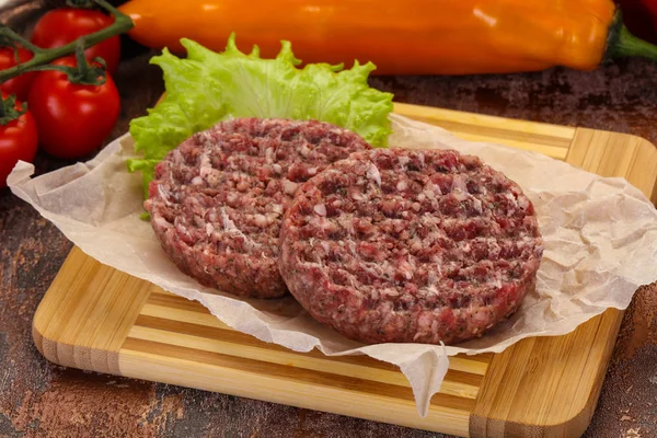 Raw burger cutlet