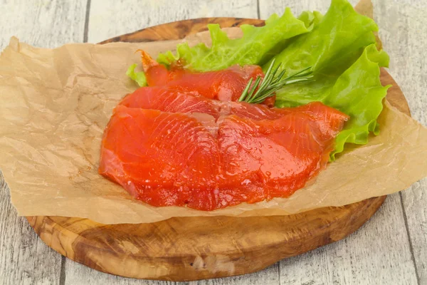 Sliced salmon fillet served rosemary — Stock Photo, Image