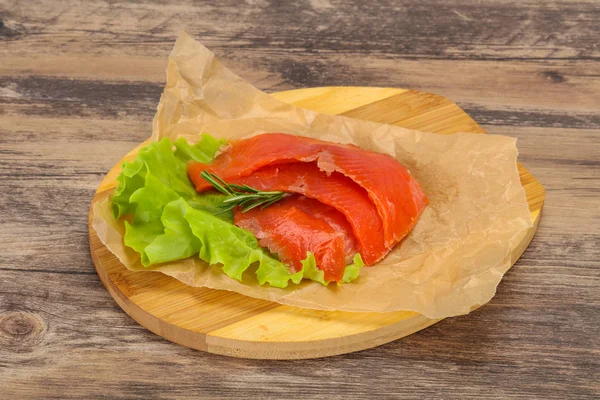 Sliced salmon fillet served rosemary — Stock Photo, Image