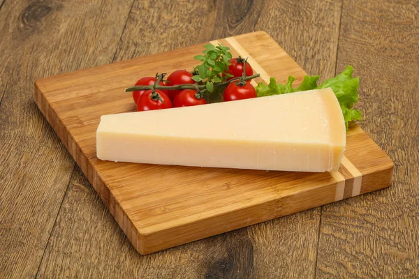 Italian traditional parmesan cheese triangle — Stock Photo, Image