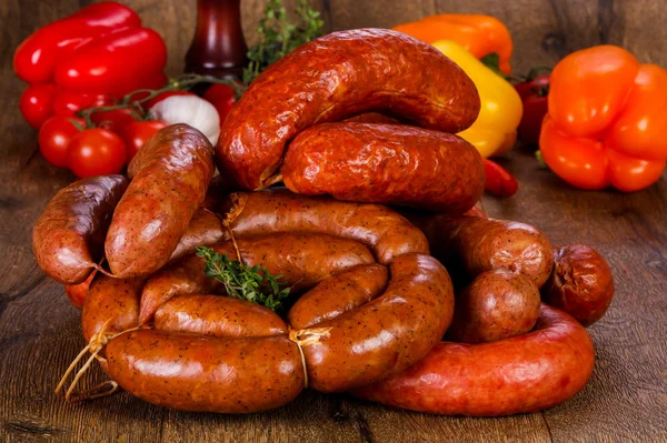 Pork sausages over wooden — Stock Photo, Image