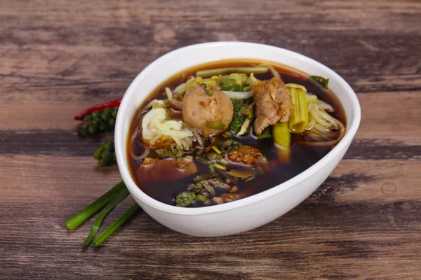 Thai style soup with meat and mushrooms — Stock Photo, Image