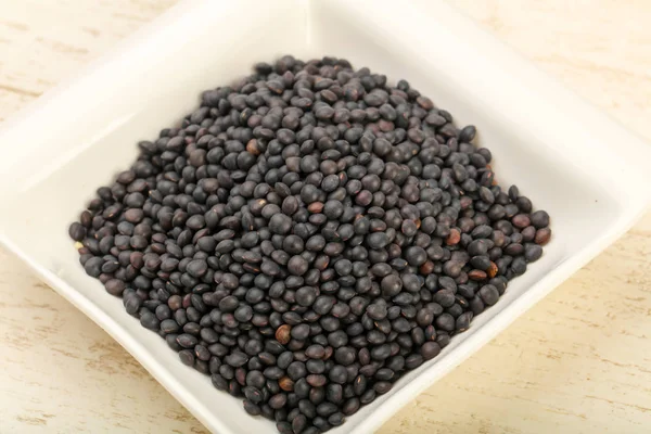 Black lentils — Stock Photo, Image