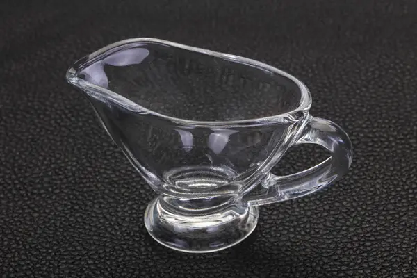 Empty glass gravy boat — Stock Photo, Image