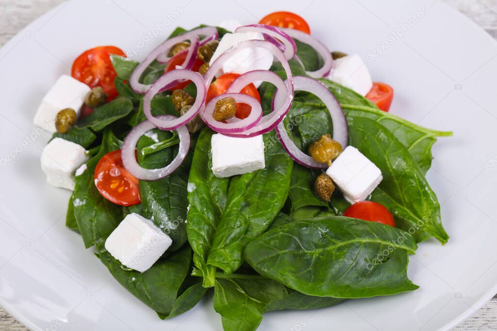 Salad with feta cheese and spinach