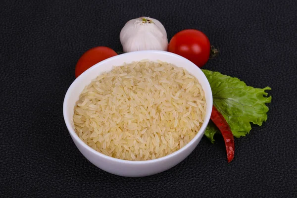 Raw Uncooked Rice Bowl Served Pepper Salad Leaves — Stock Photo, Image