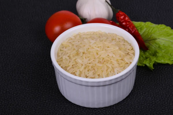 Raw Uncooked Rice Bowl Served Pepper Salad Leaves — Stock Photo, Image