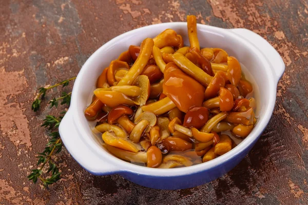 Pickled honey agaric in the bowl served thyme — Stock Image Pickled Honey Agaric Bowl Served Thyme Stock Photo