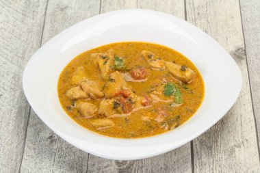 Traditional thai curry chicken soup with coconut milk clipart