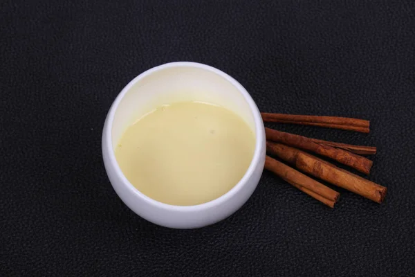 Condenced Milk Bowl Sinnamon Sticks Pastry — Stock Photo, Image