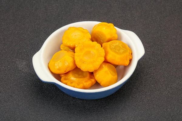 Vegetarian food - Marinated yellow patisson in the bowl