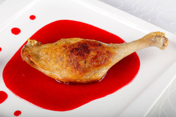 Duck leg in berry sauce