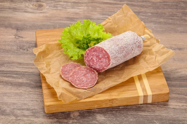 Italian Dry Saliami Pork Sausage Served Salad Leaves — Stock Photo, Image