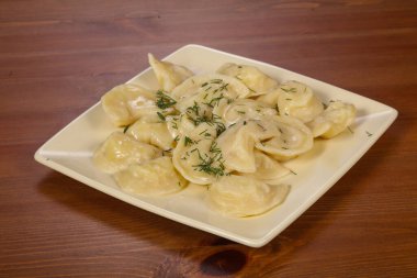 Patates püresi ve tereyağlı ev yapımı börek.