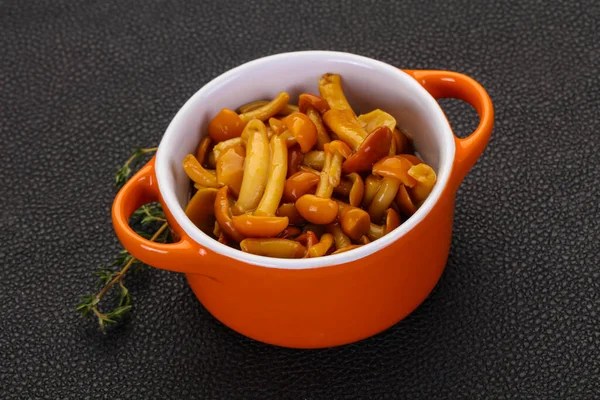 Pickled honey agaric in the bowl served thyme — Stock Image Pickled Honey Agaric Bowl Served Thyme Royalty Free Stock Images