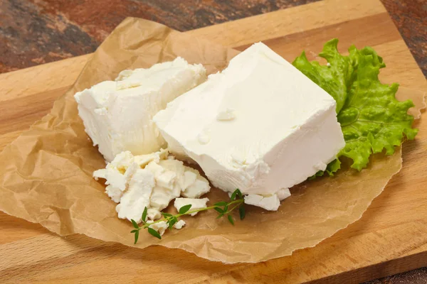 Greek traditional Feta soft cheese in the plate