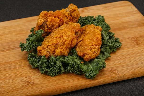 Hot fried crispy chicken wings snack
