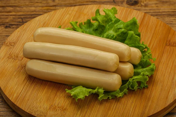 Chicken white sausage with salad leaves