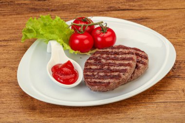 Domates soslu ızgara burger pirzolası