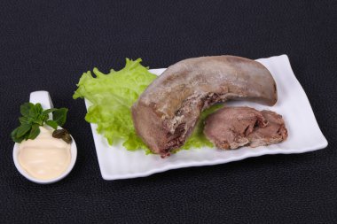 Gurmet domuz dili aperatifi.